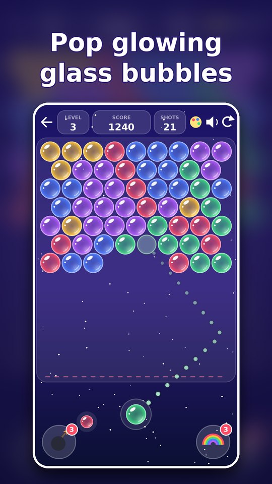 A level in play: the dotted aim line bounces off the wall towards a group of green bubbles.